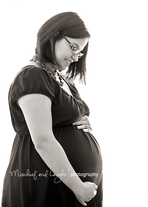 Maternity_Photography_2 Pregnant Woman Backlit against Window