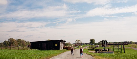 The farm offers wide open fields, silos, and barns.