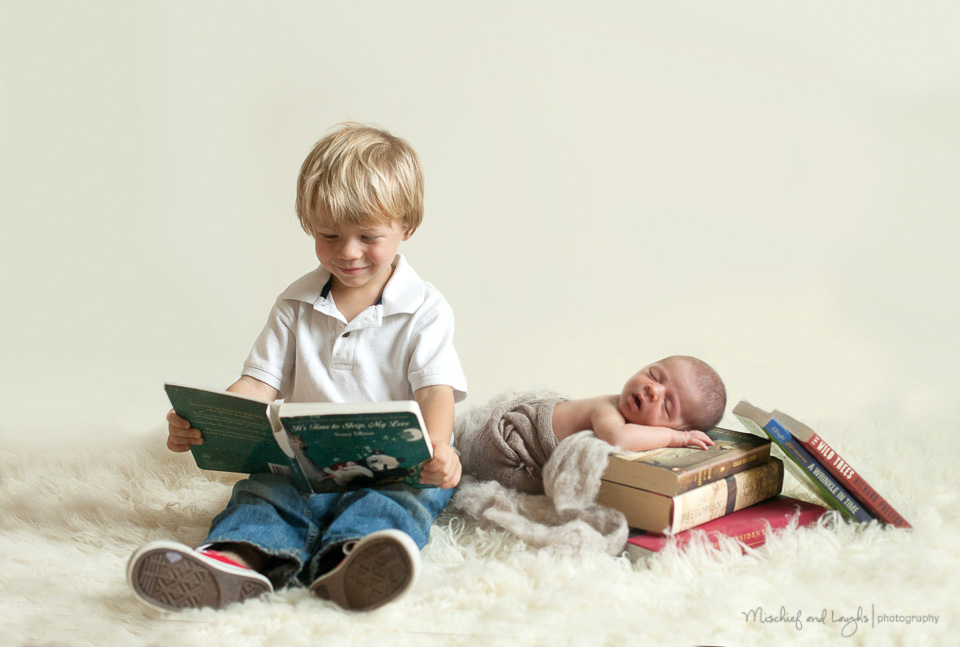 newborn with books, Mischief and Laughs, Northern Kentucky newborn photography