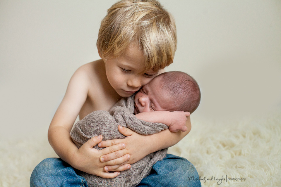 newborn with big sibling, Mischief and Laughs, Northern Kentucky newborn photography