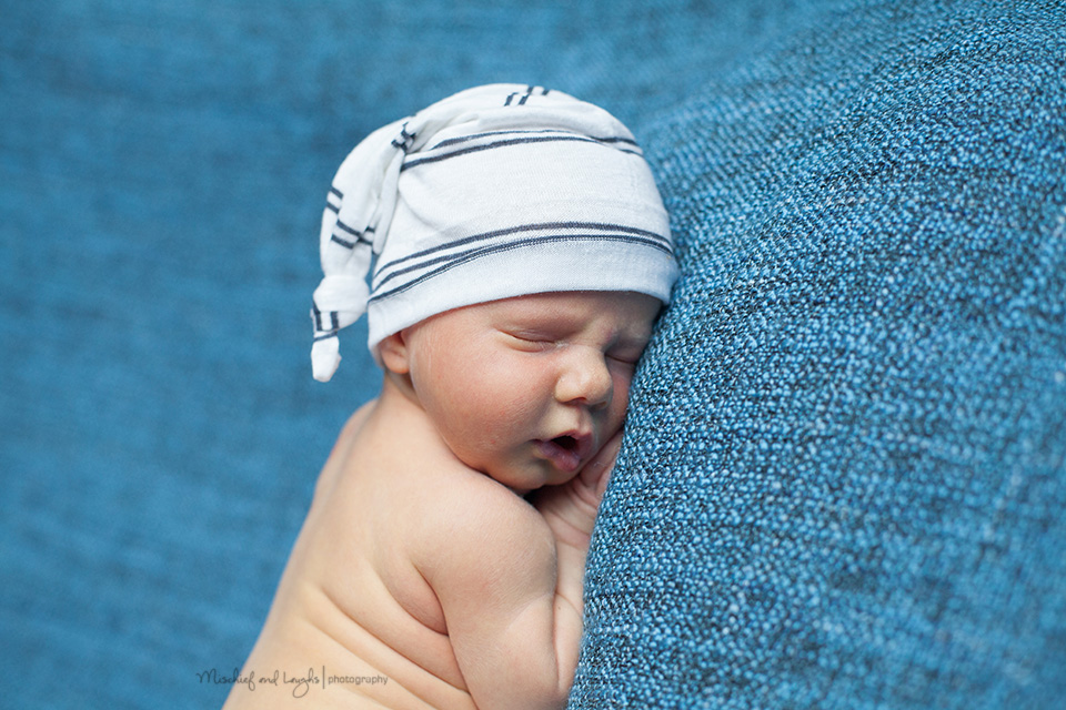 Newborn with sleeping cap, Rochester Newborn Photographer, Mischief and Laughs Photography