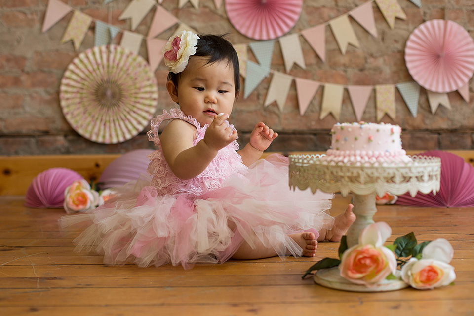 Light pink pastel girl cake smash session, Rochester NY Cake Smash, Mischief and Laughs Photography 