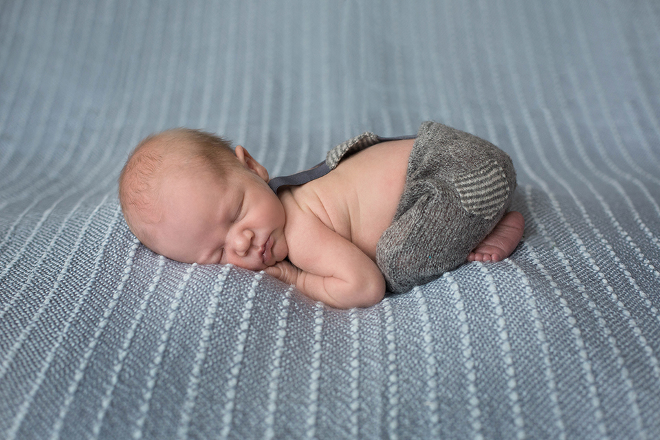Newborn baby with suspenders, Rochester Newborn pictures, Mischief and Laughs Photography 