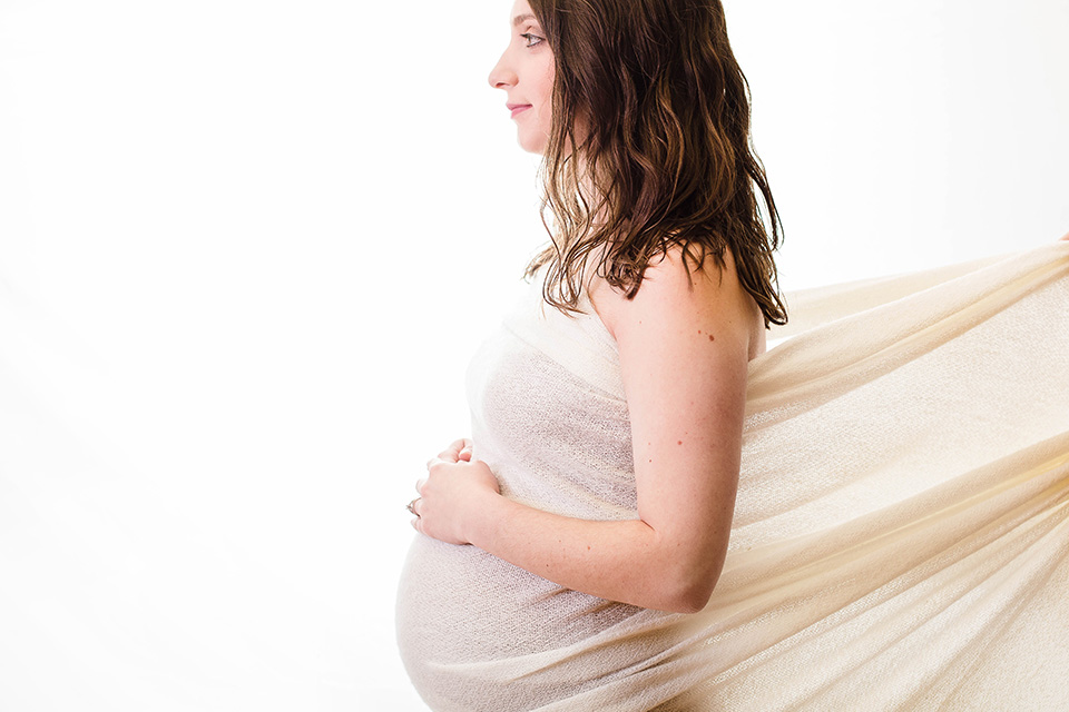 simple backlit maternity pictures, Cincinnati OH photography studio