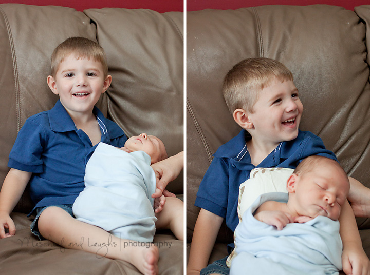 big brother holds his new baby