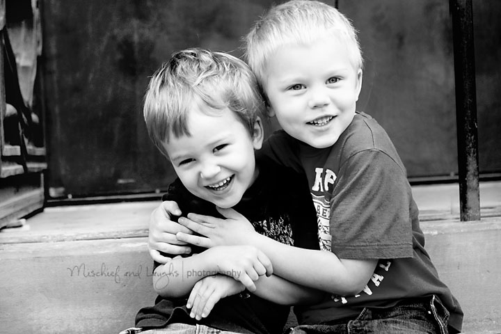 brothers share a laugh and a hug