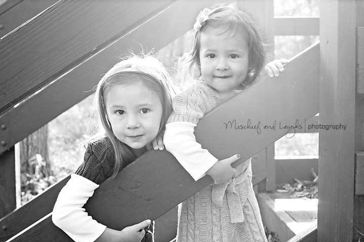 sun lit portrait of two little girls