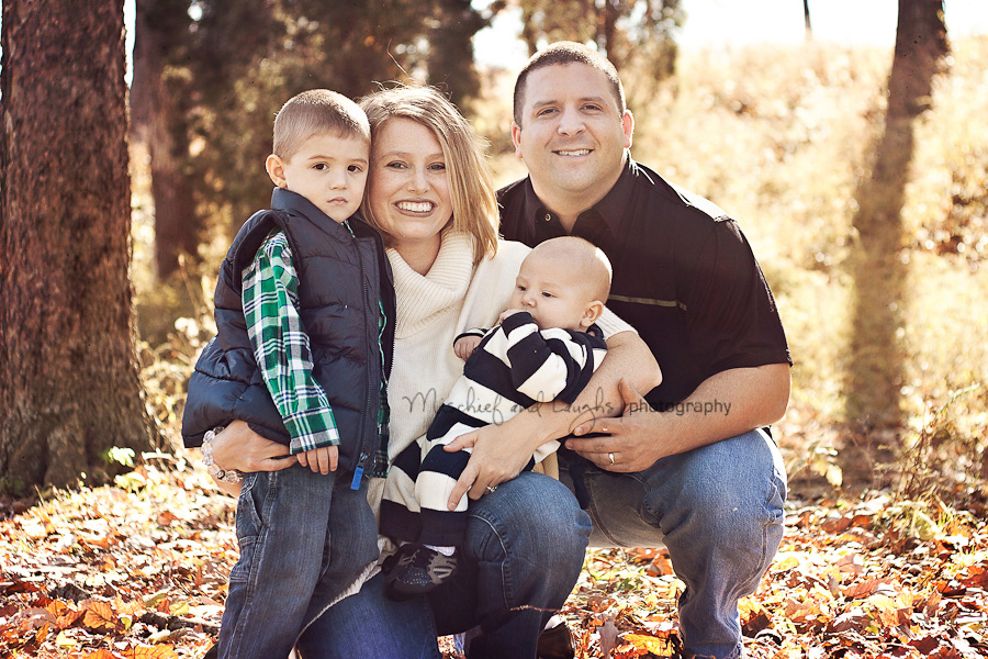Outdoor family pictures in the fall leaves