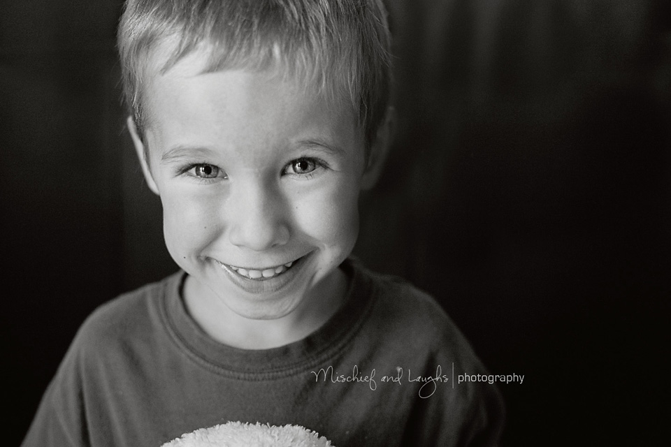 five year old with sparkling eyes black and white