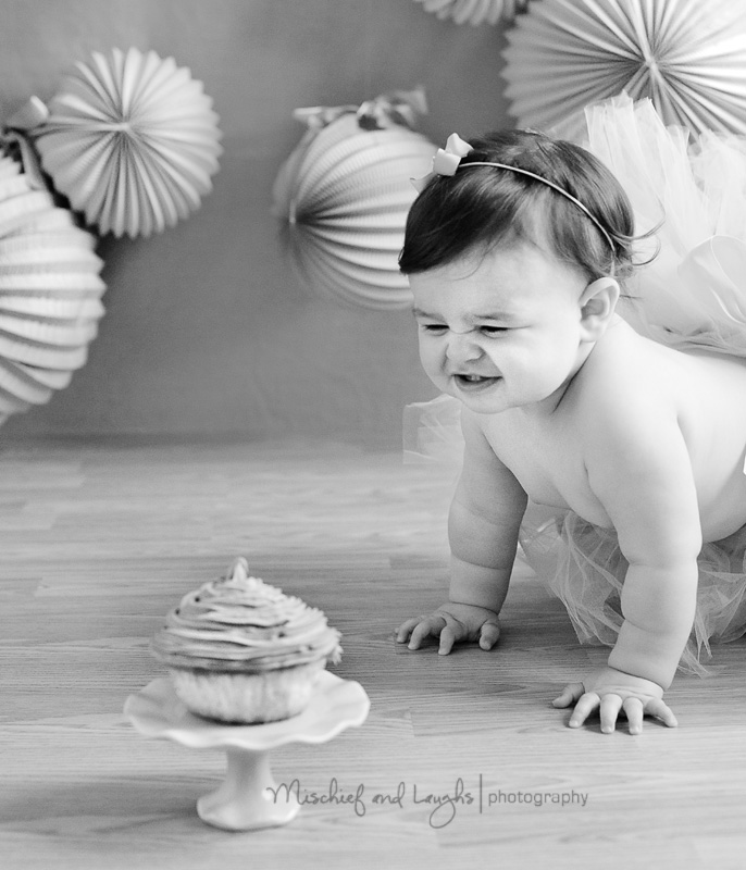 baby with cake first birthday