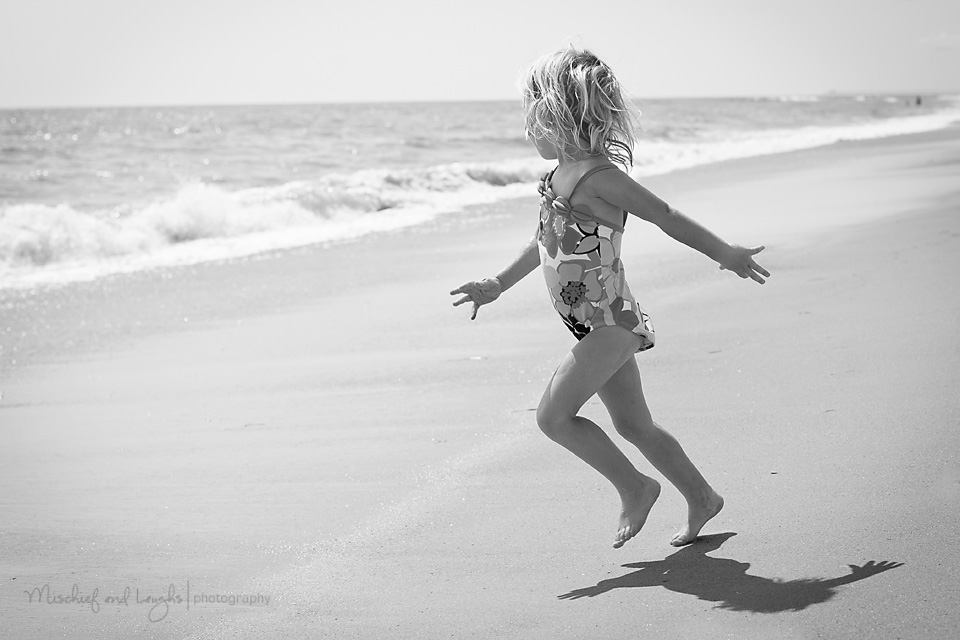 Little Girl running to the water
