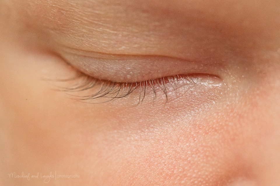 close up shot of newborn baby eyelashes