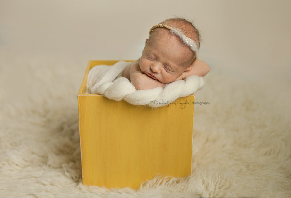 Newborn baby with angel halo, Cincinnati newborn photos, Mischief and Laughs