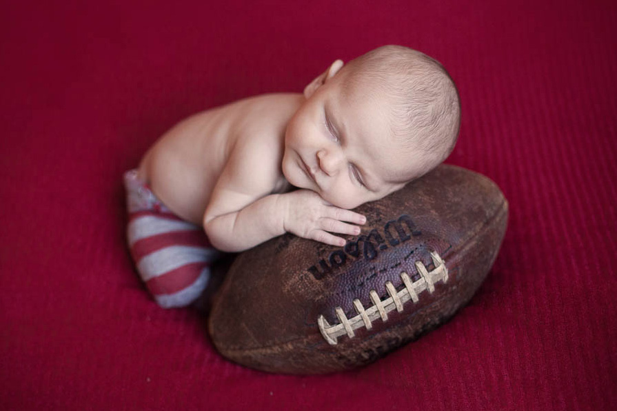 Football newborn pictures, Rochester Newborn Photographer, Mischief and Laughs photography