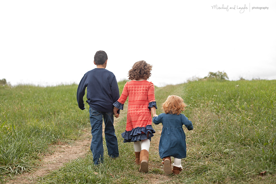 three kids on the farm