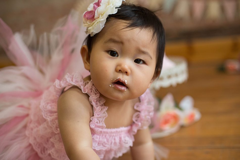 Light pink pastel girl cake smash session, Rochester NY Cake Smash, Mischief and Laughs Photography