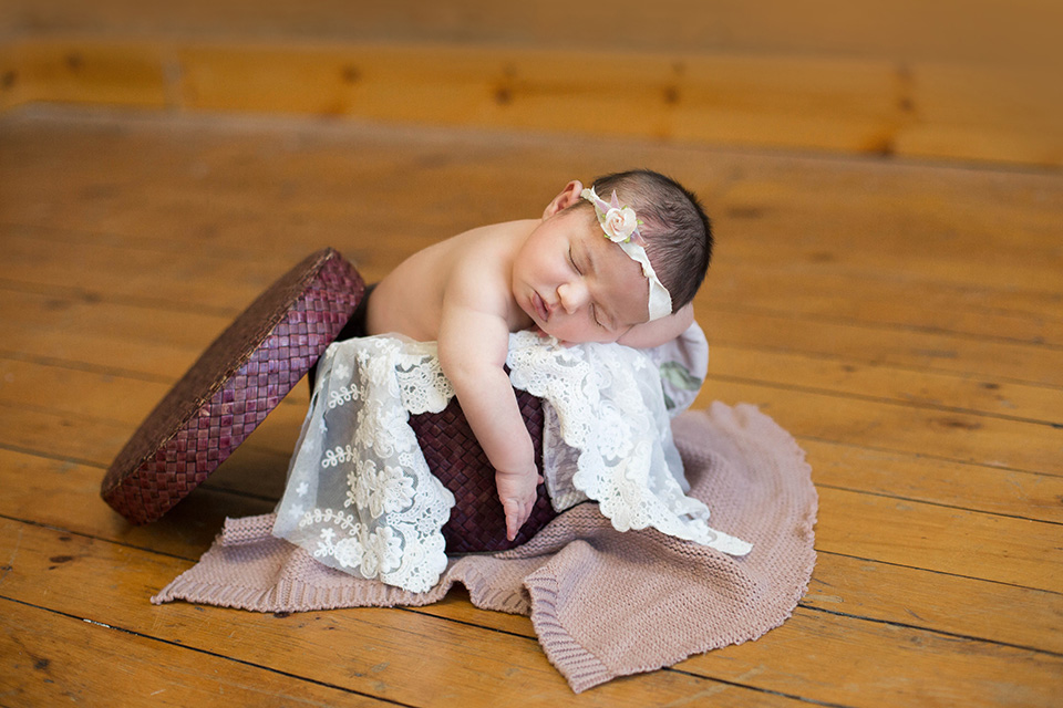 newborn baby on vintage hat box prop photos, Rochester Newborn Photographer, Mischief and Laughs Photography