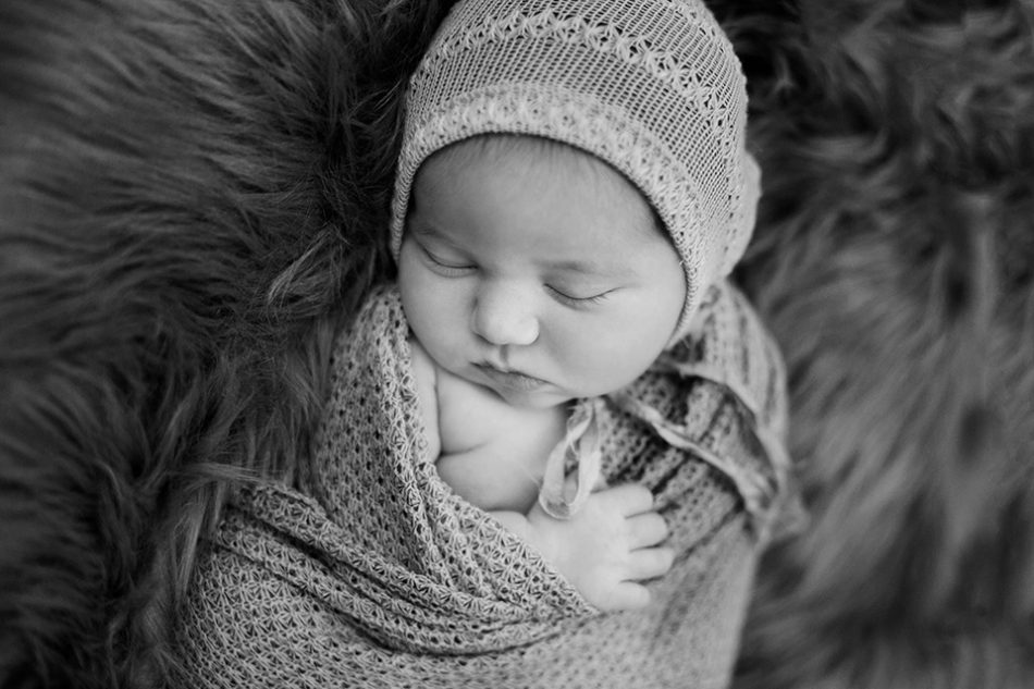 newborn baby fur, Rochester Newborn Photographer, Mischief and Laughs Photography