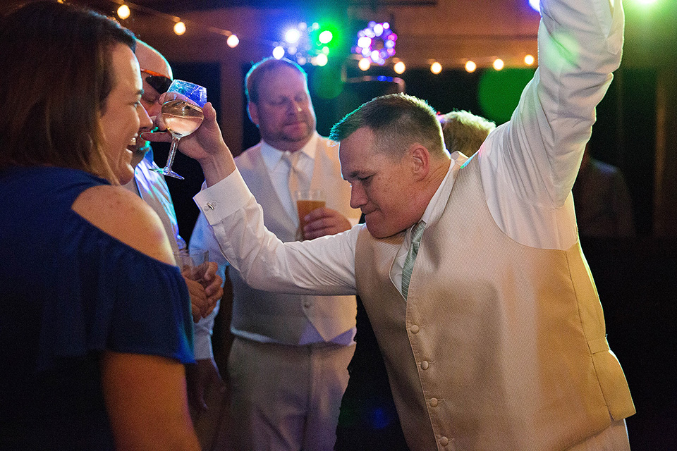 Reception Photos groom dancing and kissing, Finger Lakes wedding photographer, Zugibe Vineyards