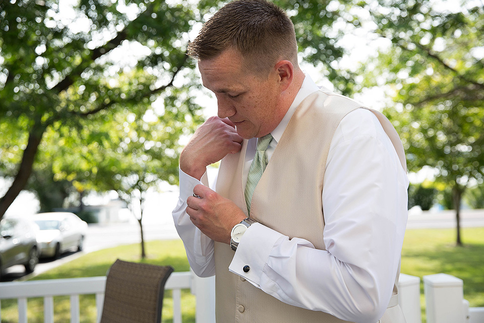 Groom gets ready at the lake house, Finger Lakes wedding photographer