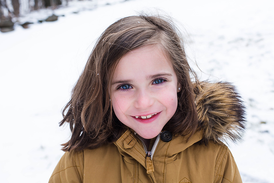 professional family photographer in Cincinnati OH, snow portrait session