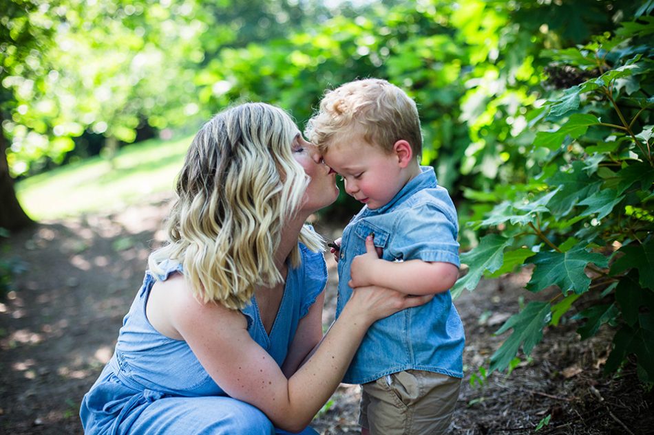mom kissing little boy on forehead, Cincinnati OH children's photographer
