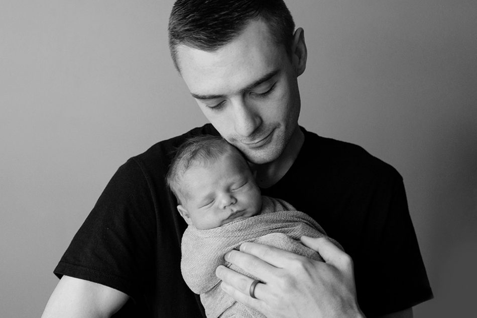 dad holding and newborn, Cincinnati newborn photographer