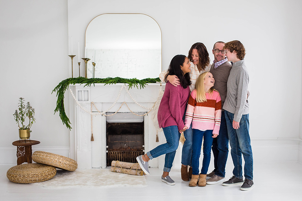 Family laughing during their White Christmas Mini Session in Cincinnati OH