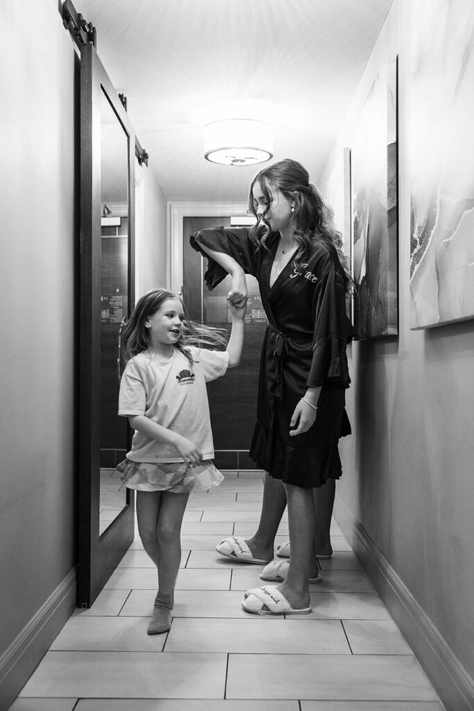 bridesmaid and flower girl dancing 