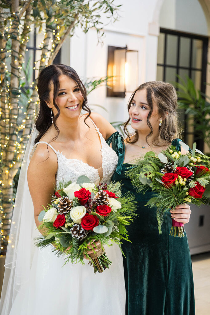 bride and her daughter at the lytle park hotel Christmas wedding pictures