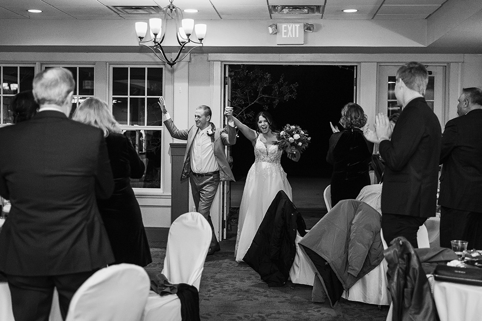Bride and groom are announced at the reception