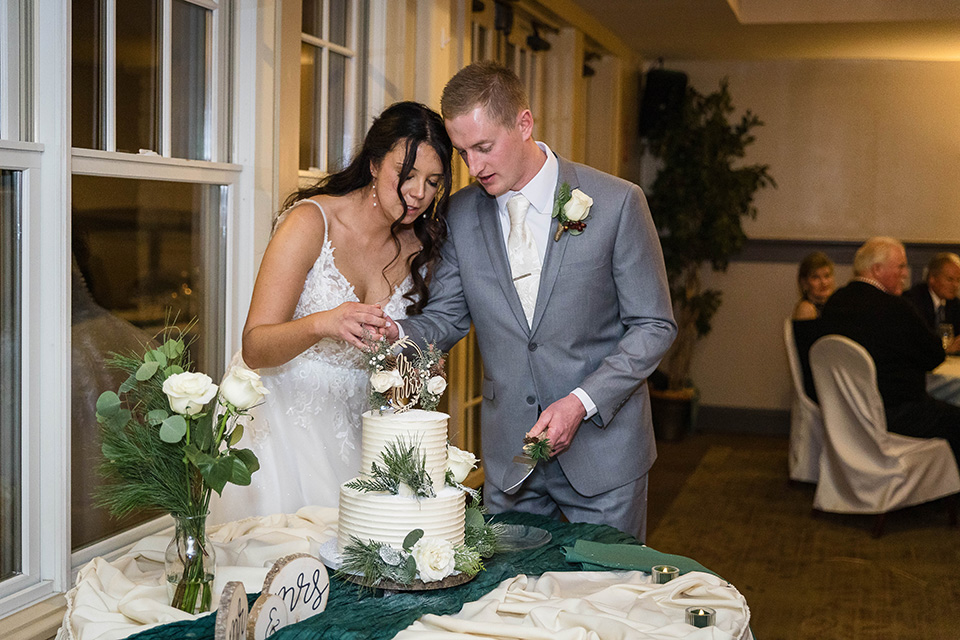 cutting the cake at the reception